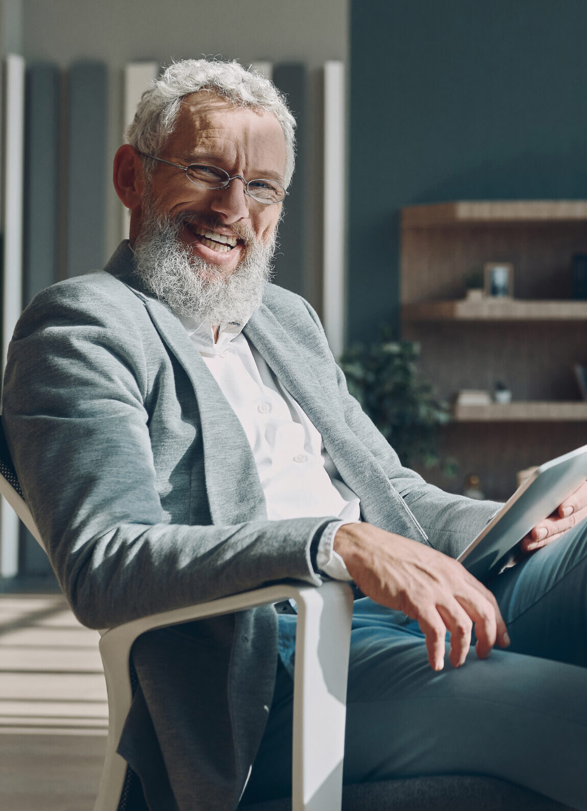 Terry seated at his desk